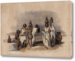    Группа нубийских женщин и детей, отдыхающих у Нила в Корти, Судан