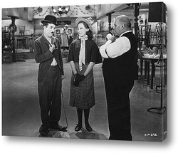    Чарли Чаплин и Палетта Годар в фильме\"Новые времена\",1936г.