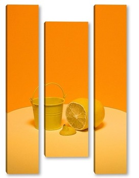 Модульная картина Натюрморт с жёлтым ведром и лимоном на оранжевом фоне
