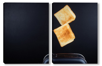 Модульная картина тостер для выпечки хлеба прыгает на черном фоне