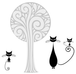    Кошечки около дерева